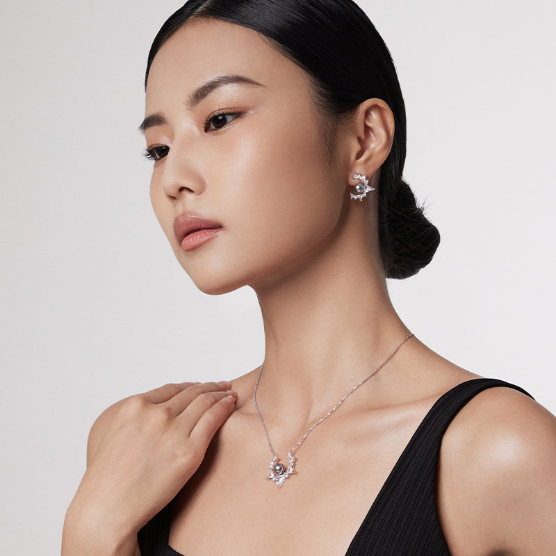 Power of Source Pearl earrings